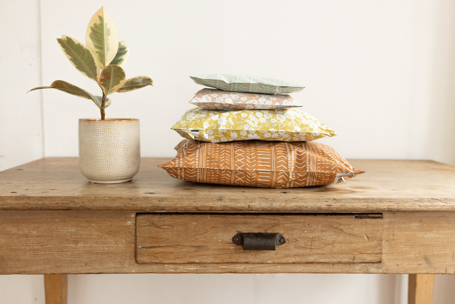 a stack of pretty poly mailer packages