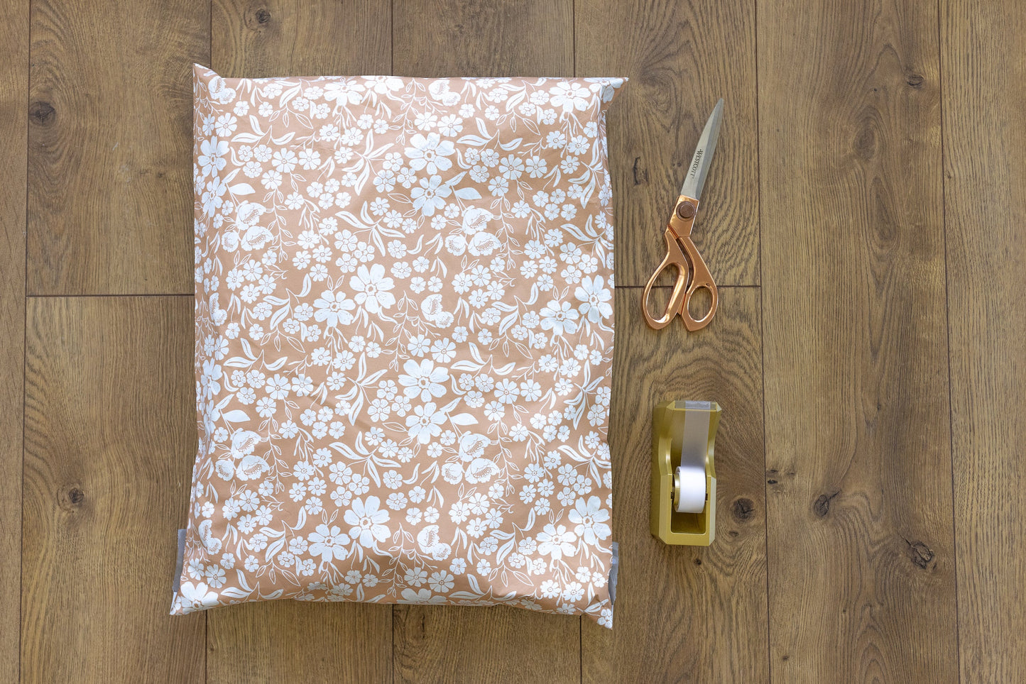 Soft and sweet pink brand color. We provide pretty packaging for your small shop including our floral shipping mailers.