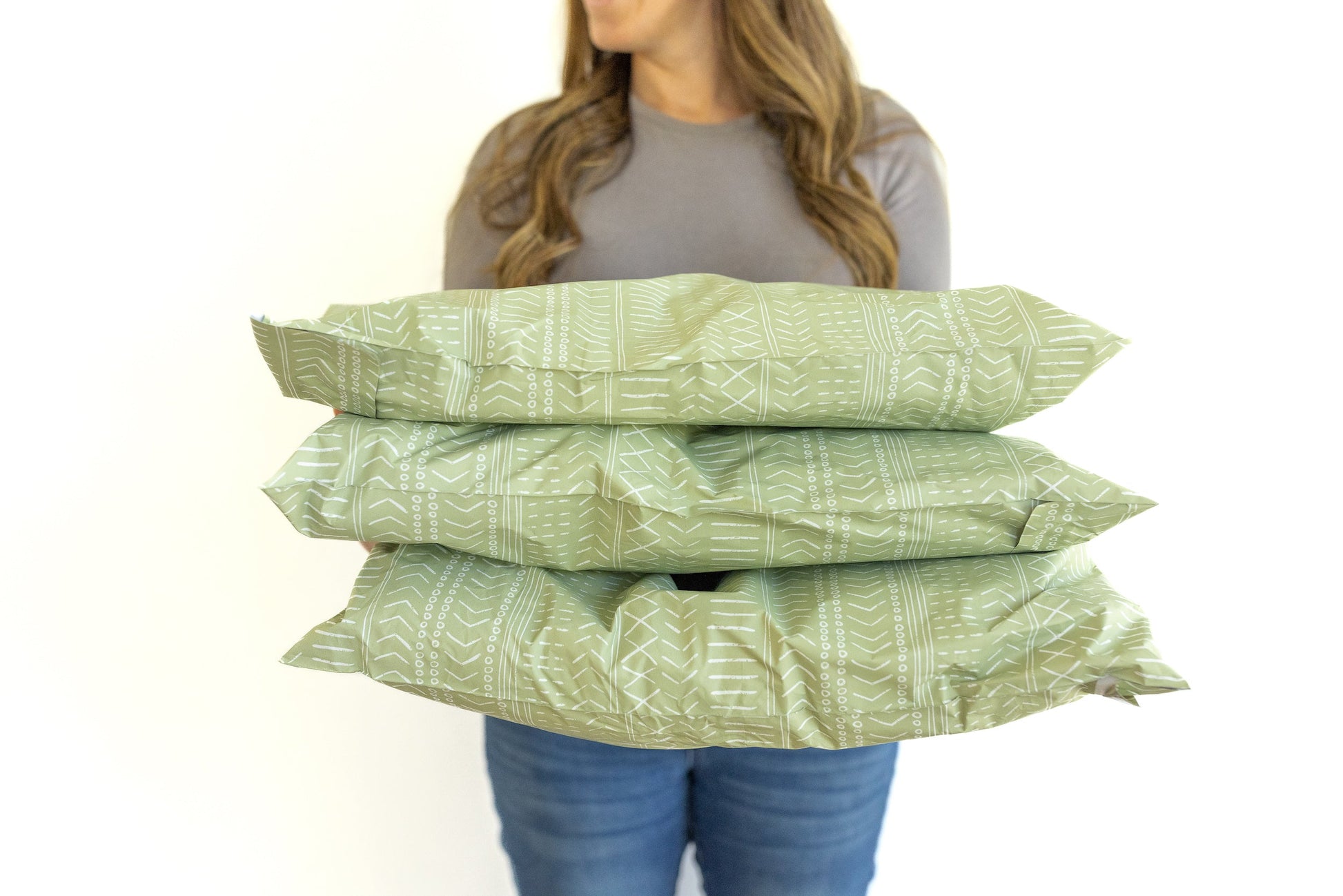 Extra Large mailing bags in a green color for shipping clothing and soft items.